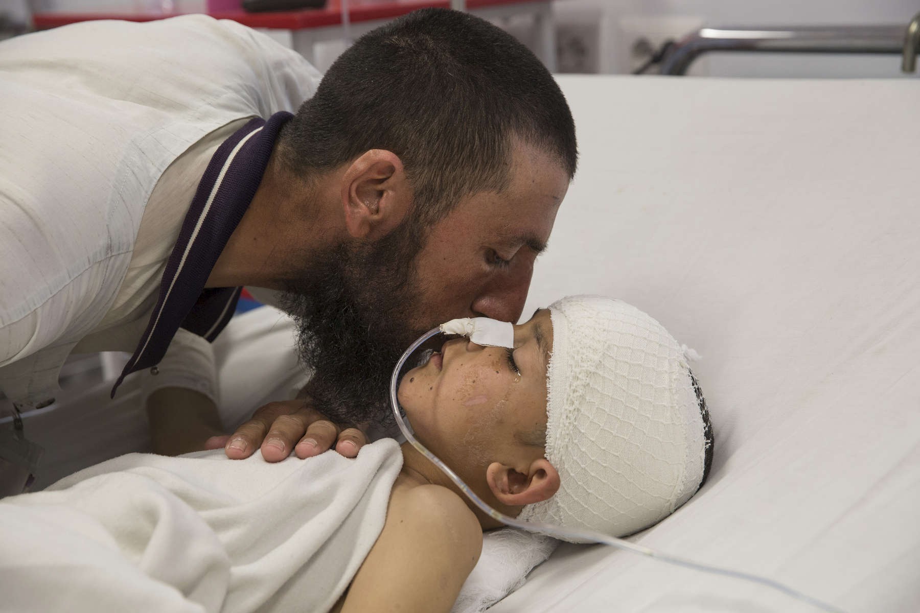 SILENT VICTIMS OF A FOREVER WAR | Paula Bronstein Photojournalist